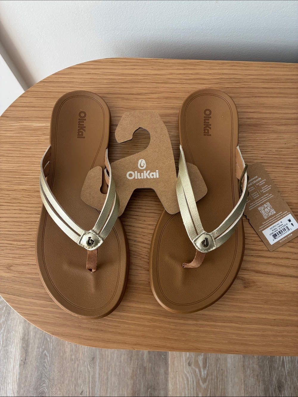 OluKai Women’s Metallic Gold Strap Brown Footbed Flip Sandals